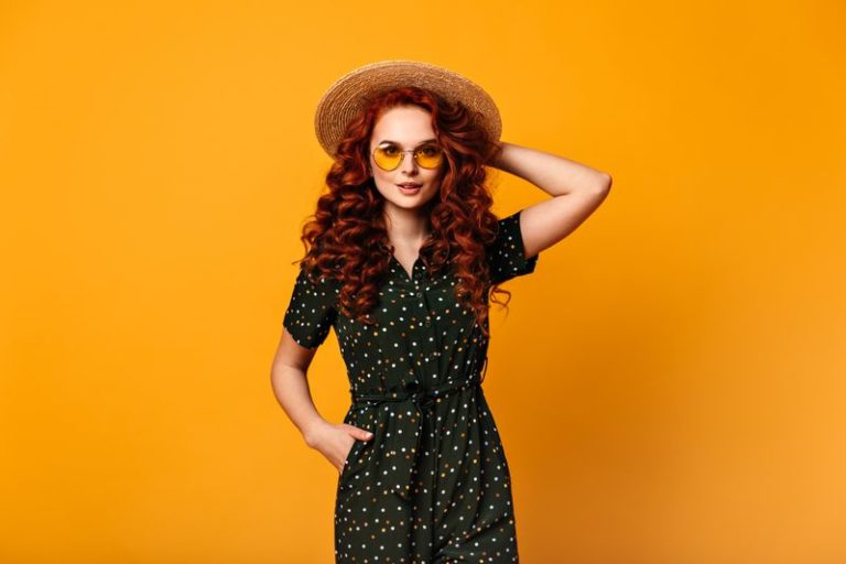 Front view of ginger girl in vintage outfit