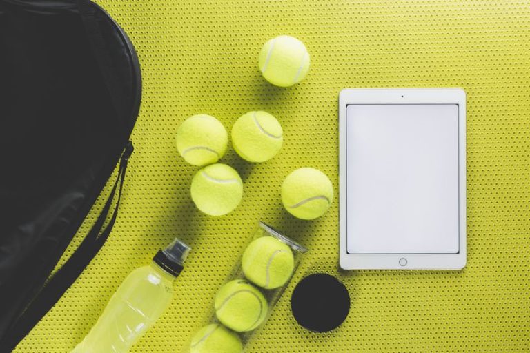 bag-near-tennis-balls-tablet